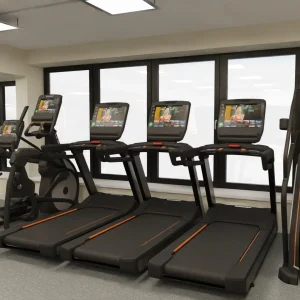 Treadmills beside the windows in the cardio area at The Southwold Gym